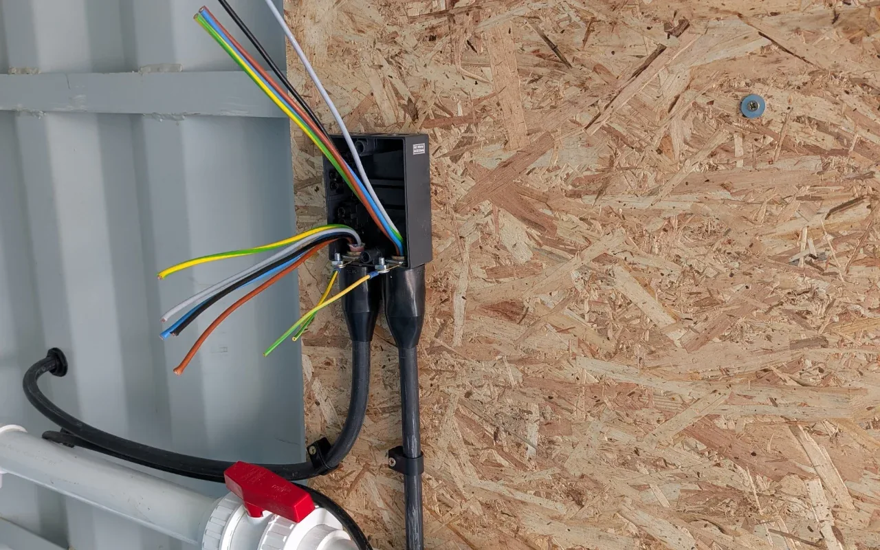 New wiring and junction box during a full rewire in Poole