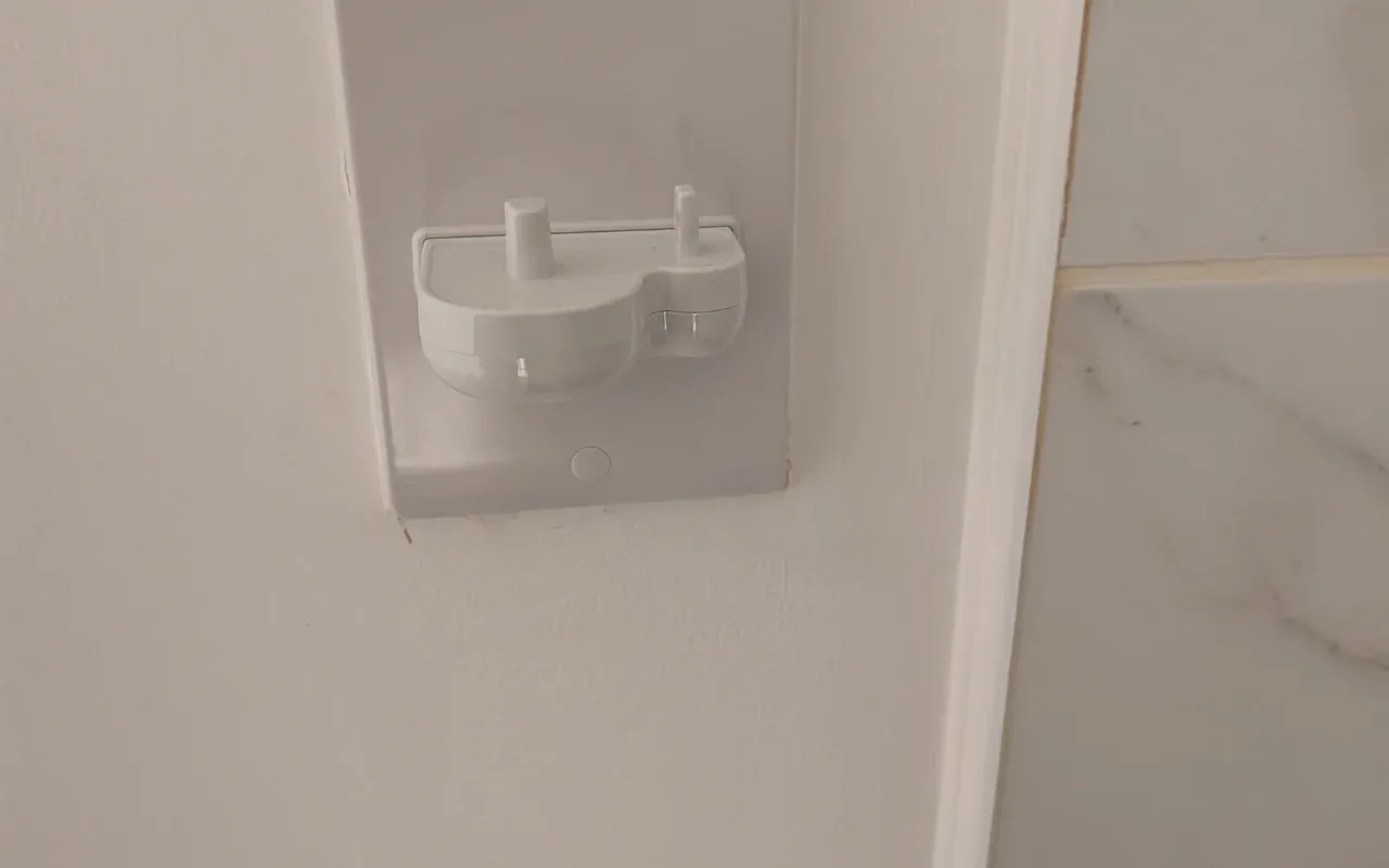 Replacement wall plate fitted during maintenance